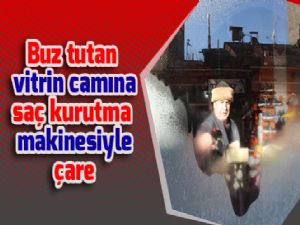 Buz tutan vitrin camına saç kurutma makinesiyle çare